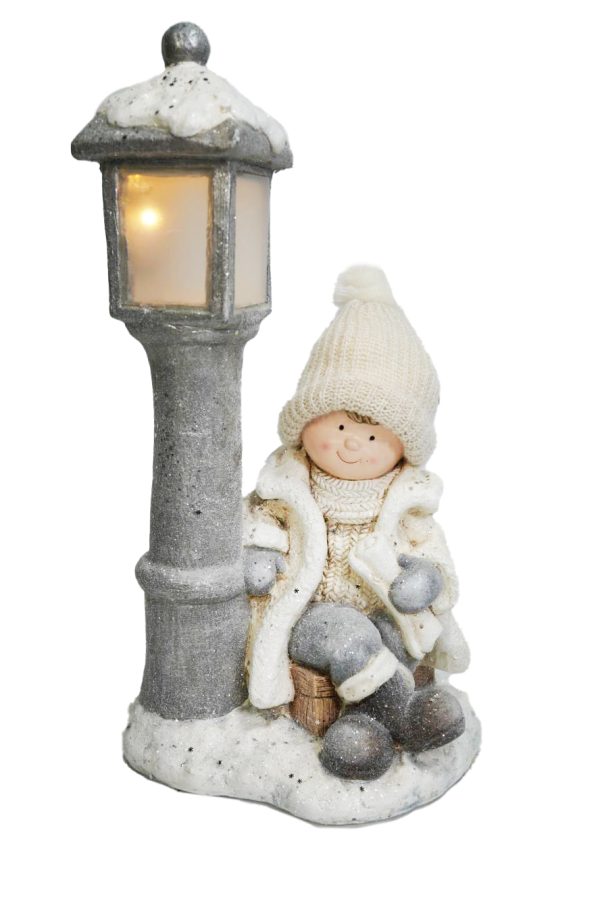 Boy Sitting Beside Street Lamp LED CH521 At beechmount garden centre